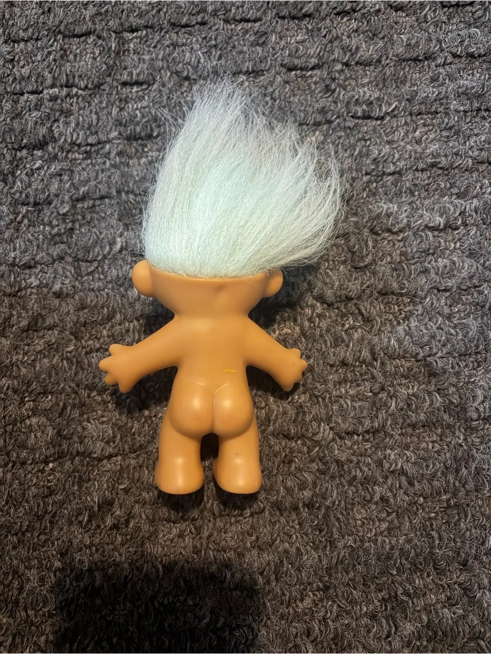 Russ treasure troll with sky blue hair.